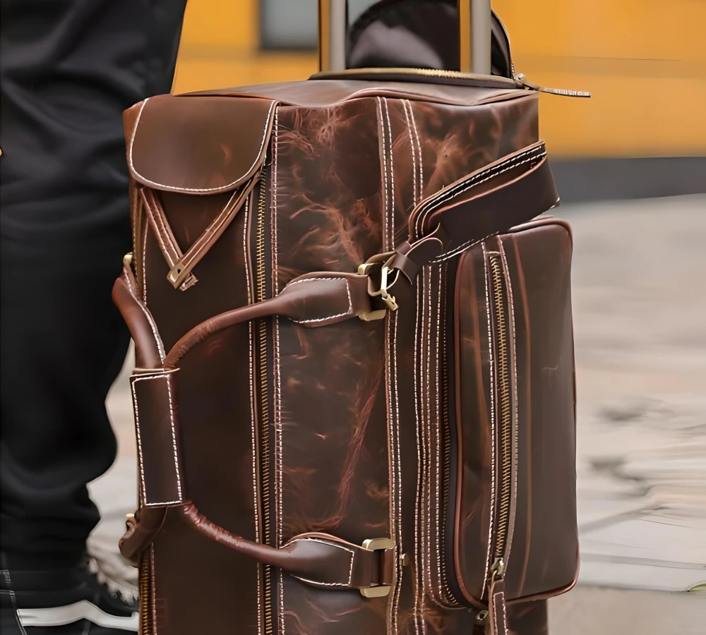 leather carry on bag wheels